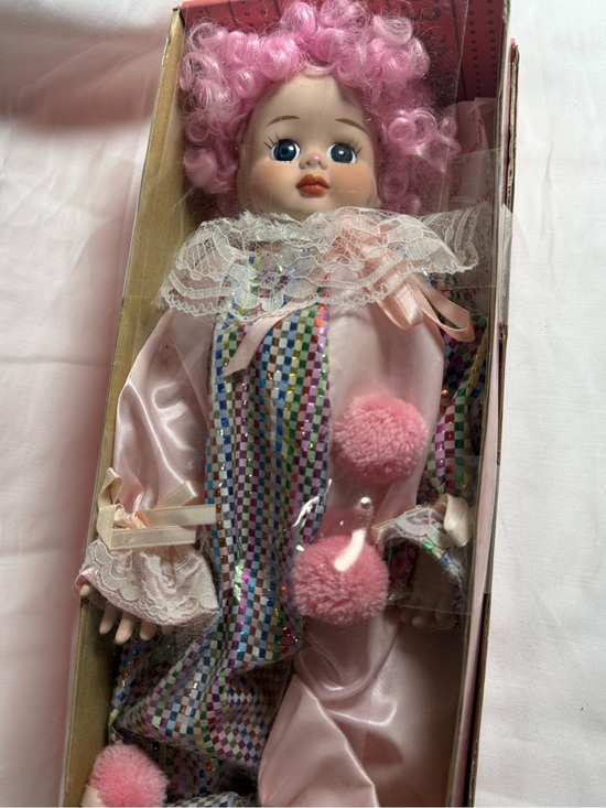Brinns Other - Pink Curly-Haired Clown Doll with Lace Collar and Pom-Pom Accents